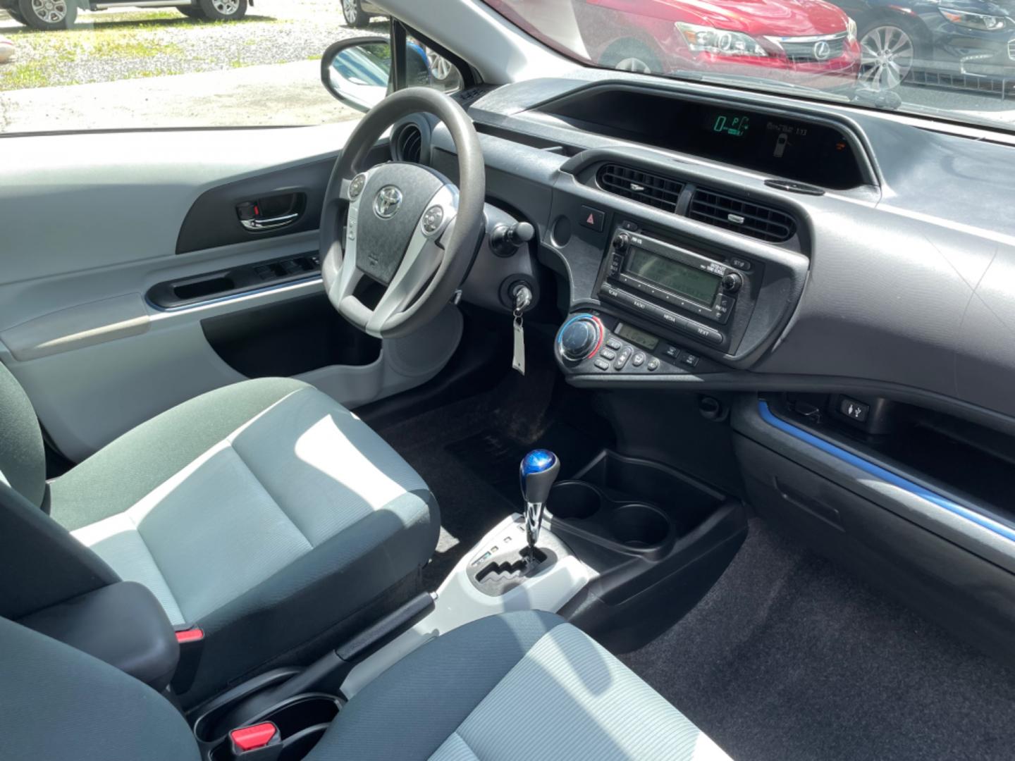 2013 BLUE TOYOTA PRIUS C ONE (JTDKDTB34D1) with an 1.5L engine, Continuously Variable transmission, located at 5103 Dorchester Rd., Charleston, SC, 29418-5607, (843) 767-1122, 36.245171, -115.228050 - Super clean interior with CD/AUX/Bluetooth, Power Windows, Power Locks, Power Mirrors, Spacious Cargo for it's size, Keyless Entry. Local Trade-in! Certified ONE Owner Vehicle!! 122k miles Located at New Life Auto Sales! 2023 WINNER for Post & Courier's Charleston's Choice Pre-owned Car Dealer AND - Photo#8